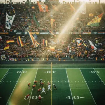 Amon-Ra St. Brown in Detroit Lions uniform running a route during an NFL game in 2025