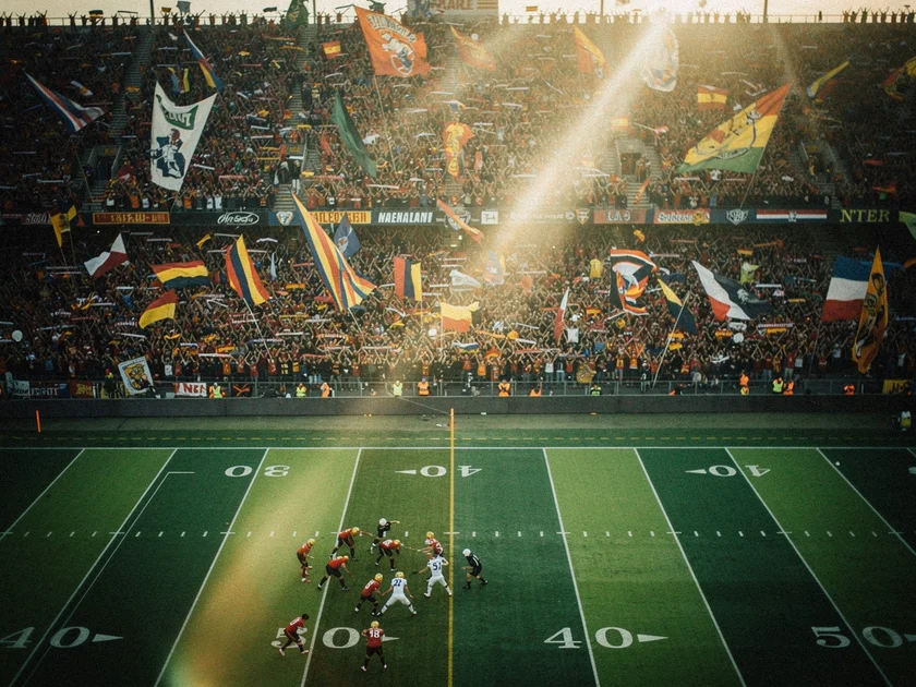 Amon-Ra St. Brown in Detroit Lions uniform running a route during an NFL game in 2025