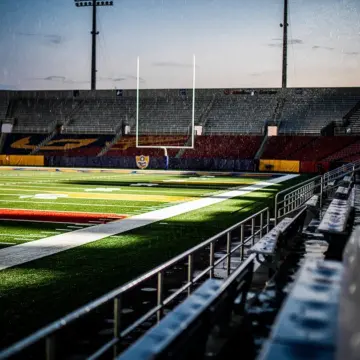 Caleb Williams in Chicago Bears uniform preparing to throw during 2026 NFL offseason roster changes