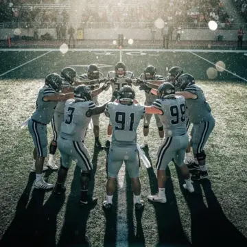 Carolina Panthers defensive lineman rushing the passer during an NFL game in 2026