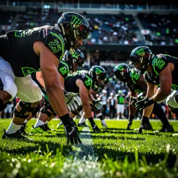 Cincinnati Bengals offensive linemen in formation during an NFL game, highlighting trench needs