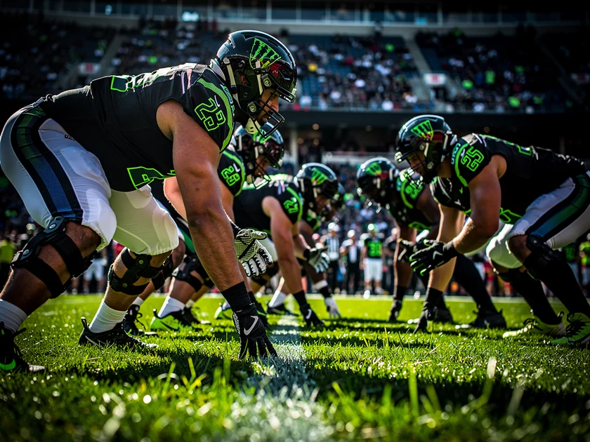 Cincinnati Bengals offensive linemen in formation during an NFL game, highlighting trench needs