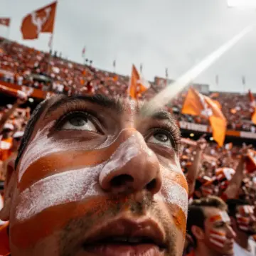 dallas-cowboys-draft-trade-bailey-0404 Dallas Cowboys helmet on draft board backdrop ahead of 2026 NFL Draft trade-up pursuit